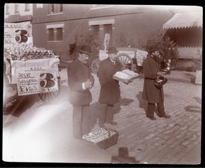 View of street vendors selling figs and other goods near 6th Avenue, New York, c.1903